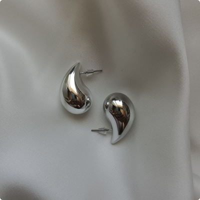 Aretes Bottega plateado