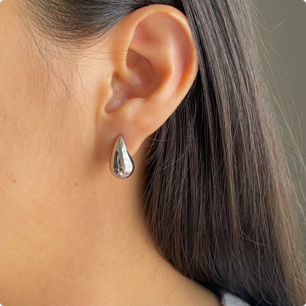 Aretes Bottega plateado