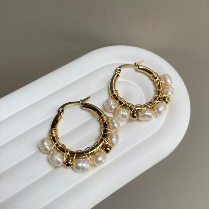 Argollas perlas y acero