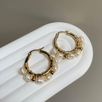 Argollas perlas y acero