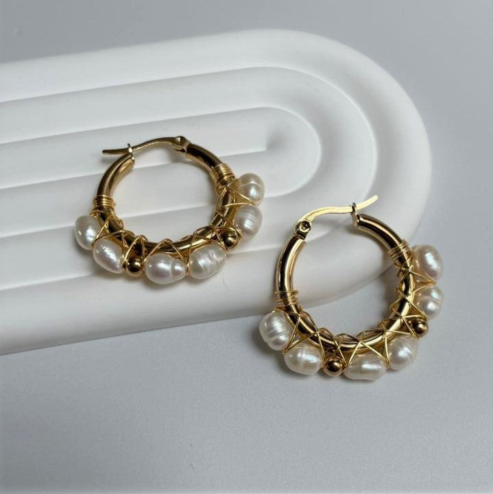 Argollas perlas y acero